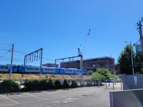 Train Passing by Construction Site