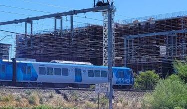 train in front of construction site