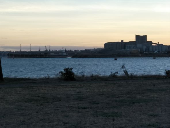 Port Facility in Distance Across Water