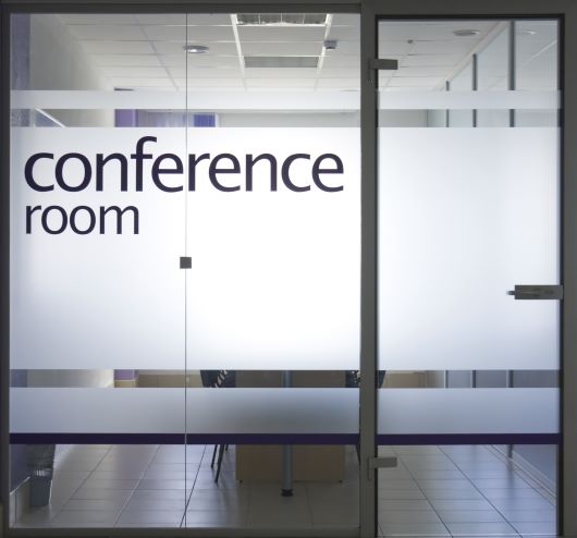 doors with conference room written on them